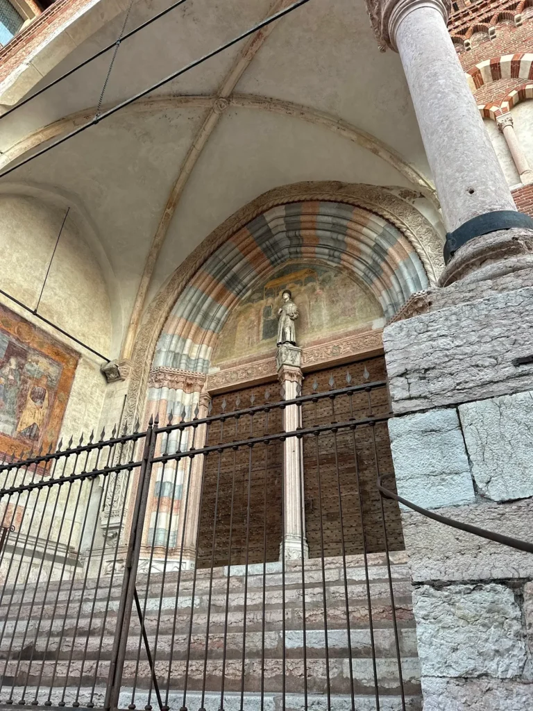 best churches in Verona San Fermo Maggiore entrance arch and doorway details