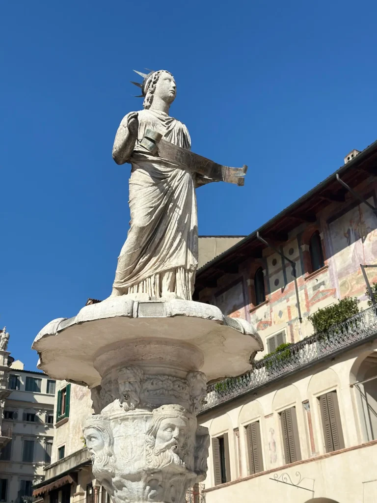 Madonna fountain in Piazza delle Erbe, Verona during a 2 days in Verona itinerary