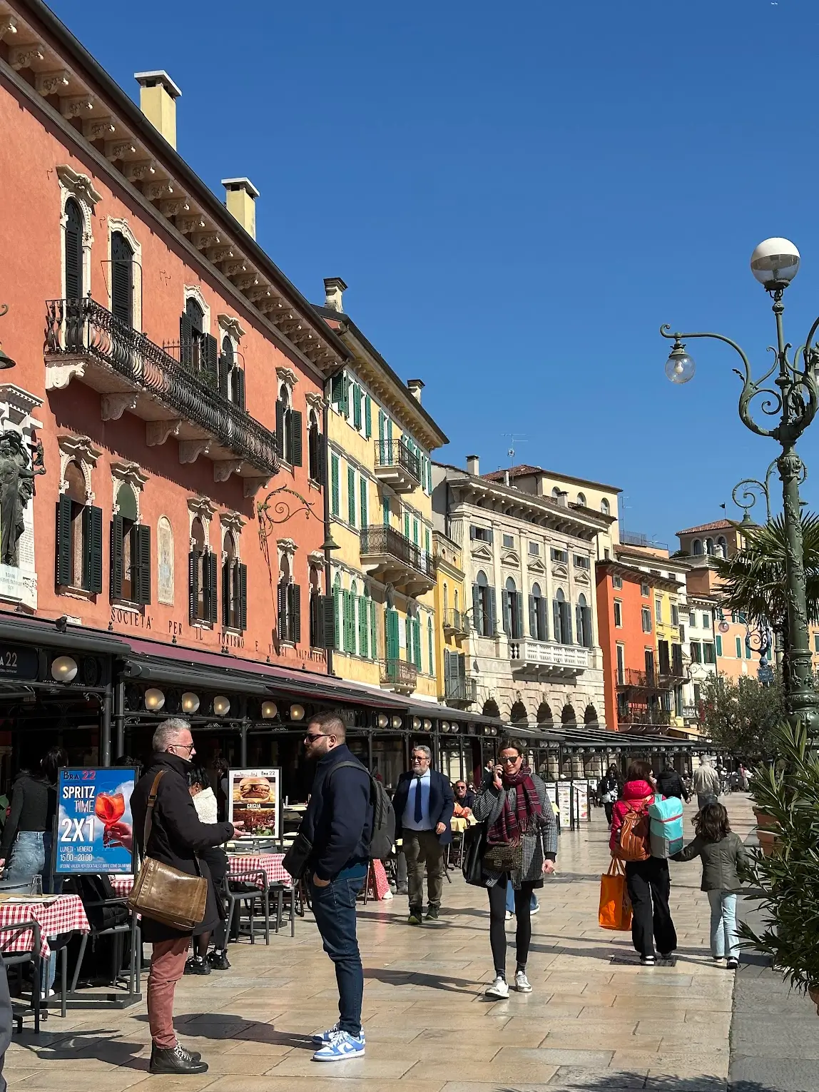 Piazza Bra colorful historic buildings and cafes in Verona Italy lively atmosphere and classic things to do in Verona