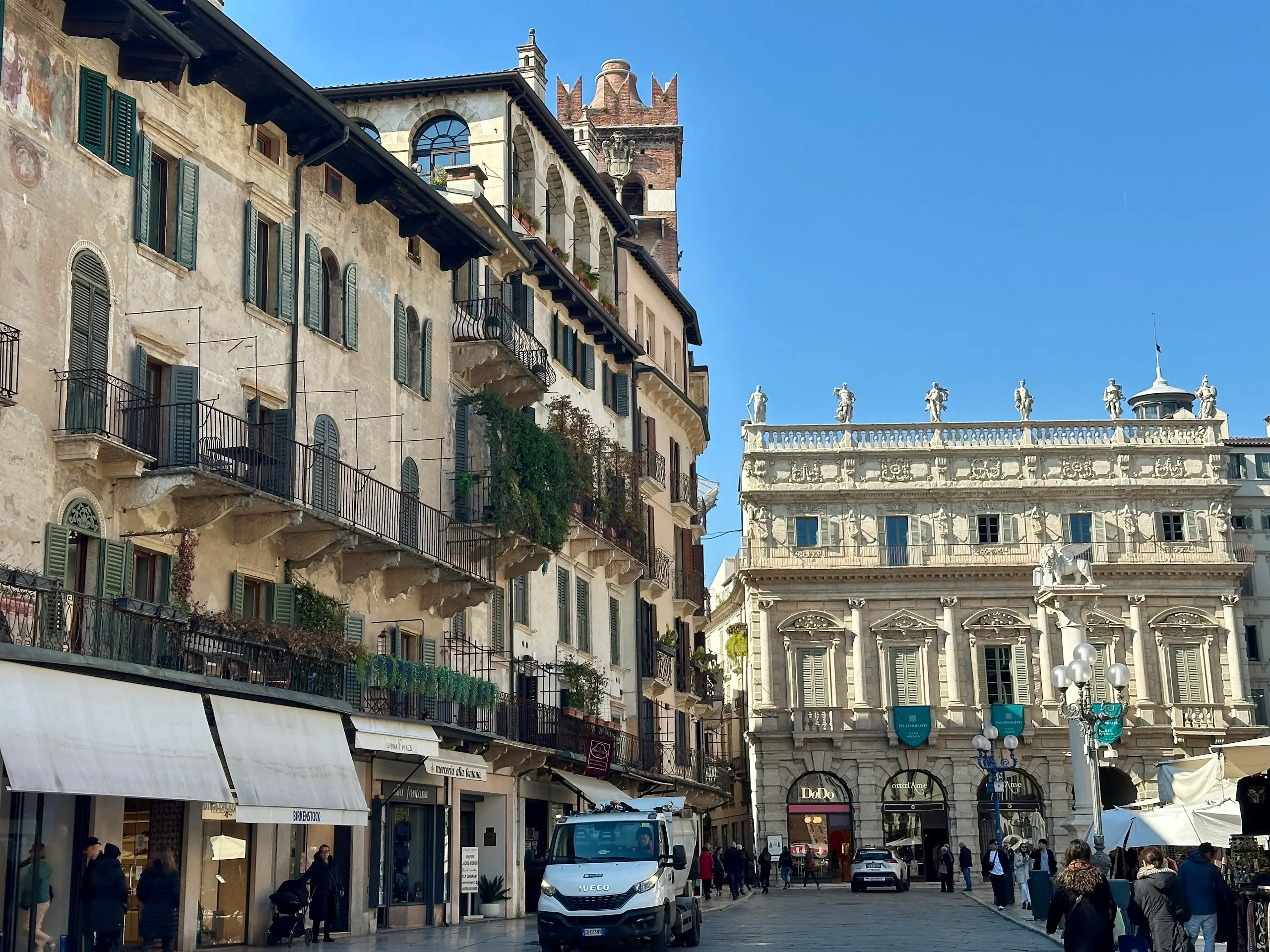 Verona piazza Piazza delle Erbe historic buildings and baroque facade street view